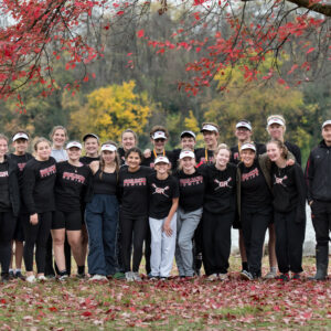 Grand Rapids Fall team, boys and girls standing alongside a river
