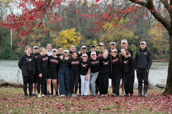 Grand Rapids Fall team, boys and girls standing alongside a river